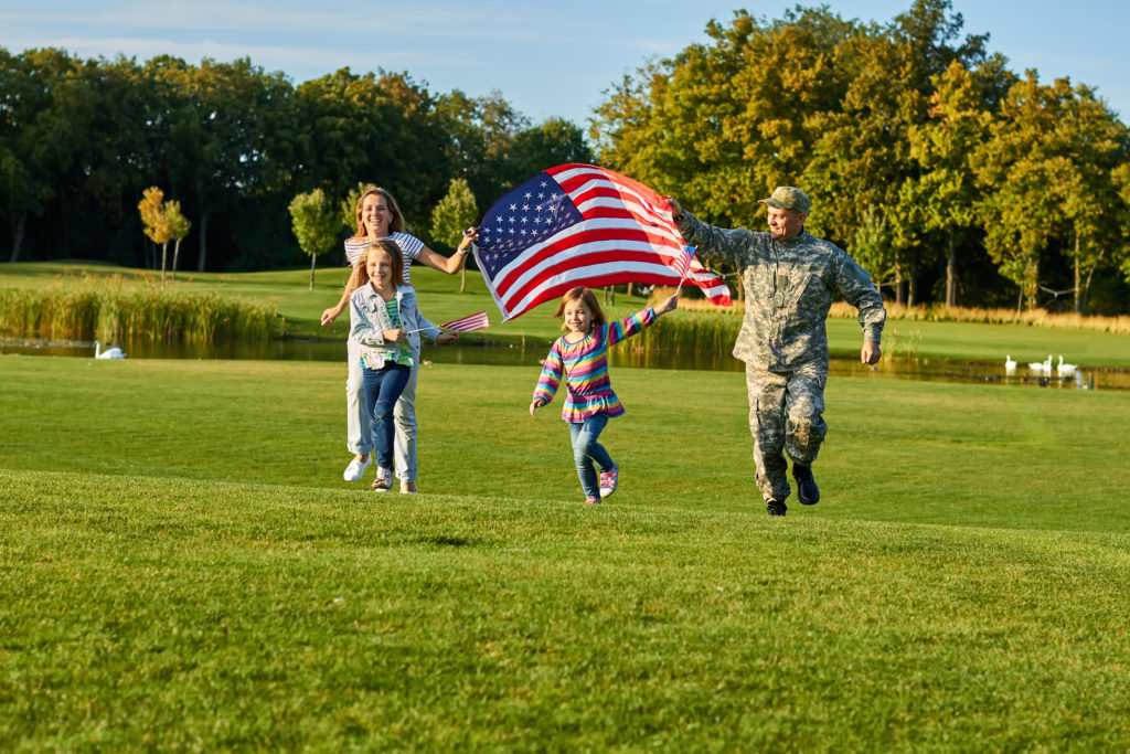 Patriotic Veteran family receives help with selling their home with a VA loan using Coldwell Banker Vanguard Realty